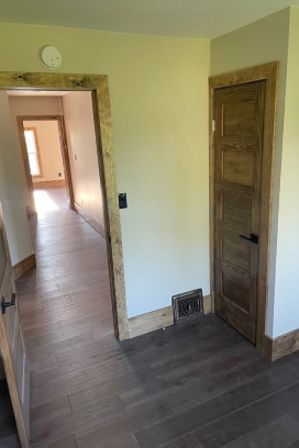 1912 house rebuild, after picture of floor - doorways - walls - trim / Vanbee Construction