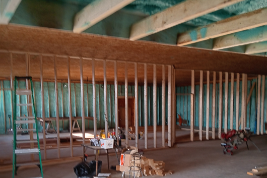 Commercial Construction (framed wall, ceiling joists and spray foam) insulation on floor