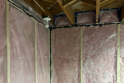 basement insulation services - exposed walls with pink batts